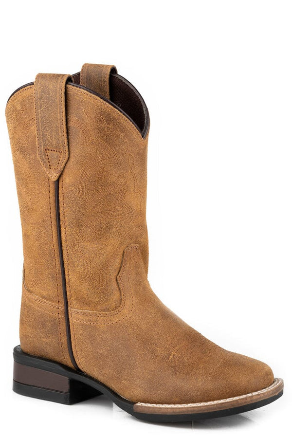 A tan-colored, square-toe, Western-style boot made of oiled suede leather with a low heel and pull tab.