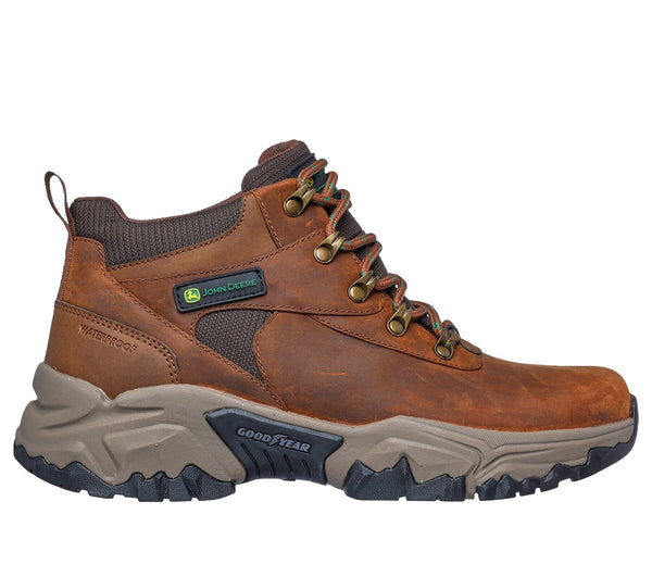 Right side view of a brown, lace-up, mid-top men's work boot with a Skechers x John Deere logo, waterproof upper, and a Goodyear rubber outsole.