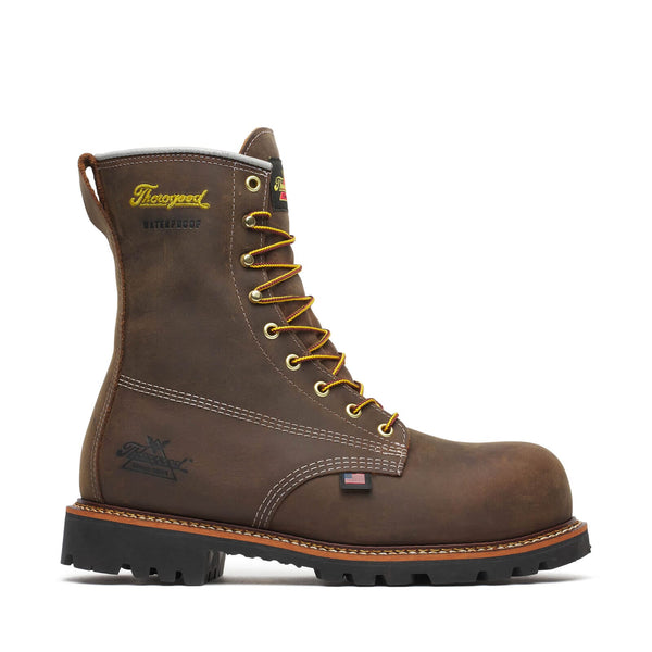 Brown work boot with yellow laces on a white background