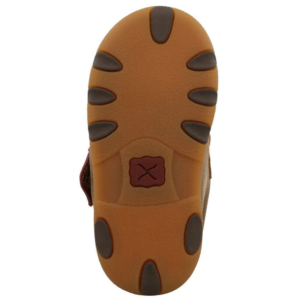 children's brown moccasin sole with brand logo on a white background