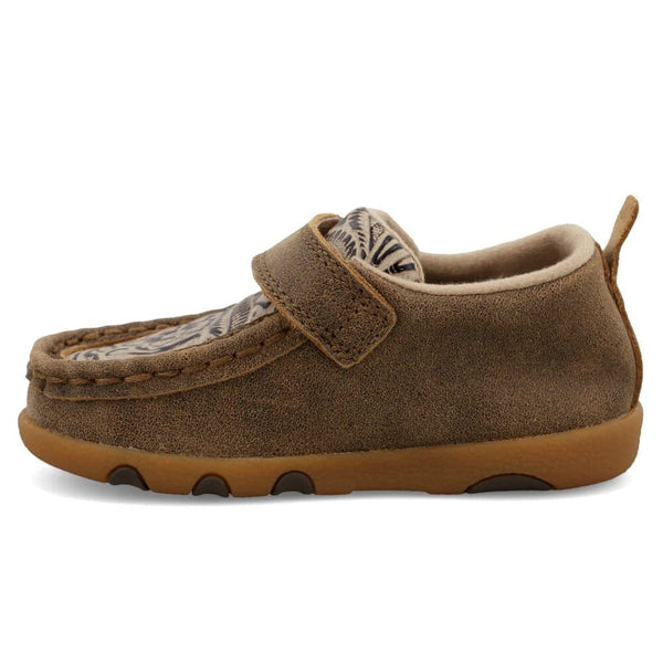 Brown children's moccasin shoe with a strap on a white background