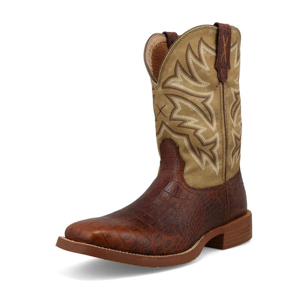 Front angled view of brown and beige cowboy boot with intricate stitching upper and alligator print lower on a white background