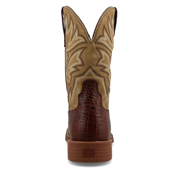 Rear view of brown and beige cowboy boot with intricate stitching upper and alligator print lower on a white background