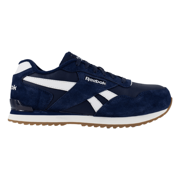 Right side view of a navy blue and white Reebok classic work sneaker with white accents and a rubber outsole on a white background.