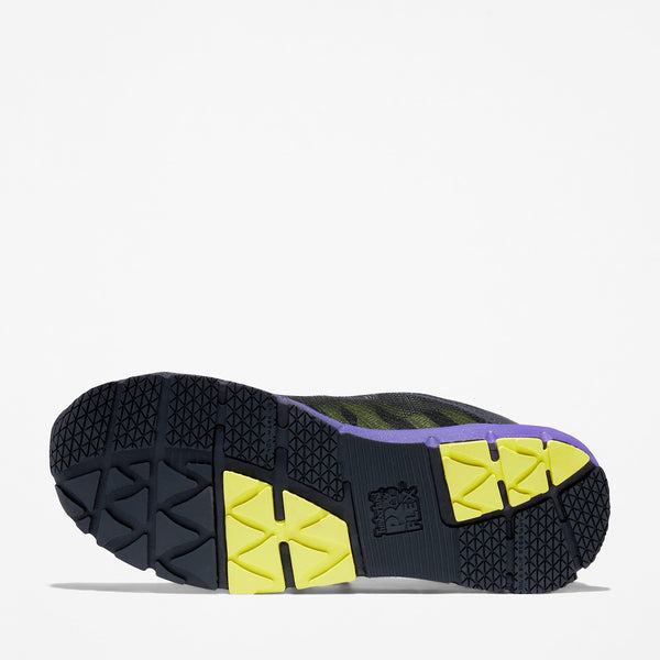Bottom of a shoe with yellow and black sole on a white background