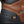 Load image into Gallery viewer, Heel detail of men's brown workboot with black accents and orange timberland pro logo