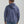 Load image into Gallery viewer, back of man wearing heather blue hoodie with medium blue jeans
