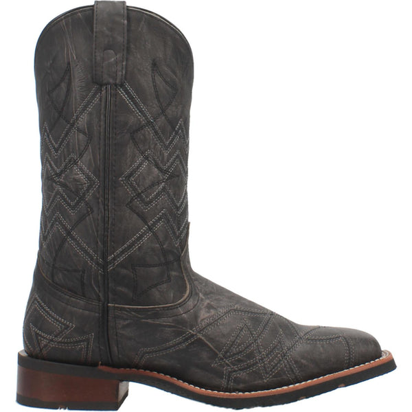 side of black cowboy boot with black and white embroidery