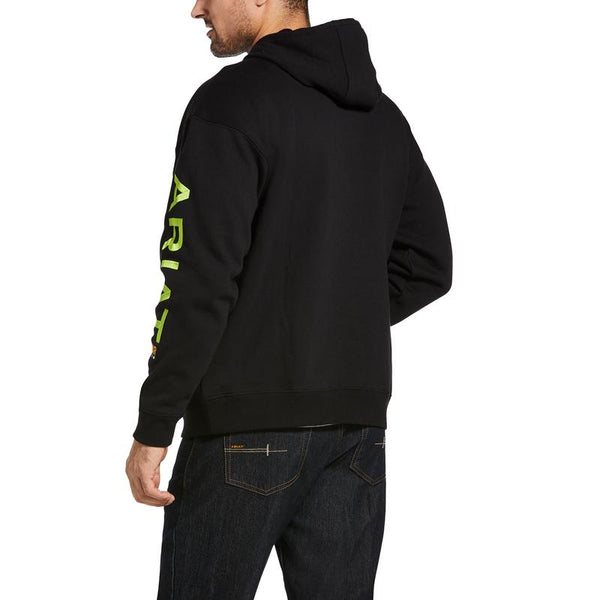 back view of man wearing black hoodie with green writing on the sleeve that says Ariat