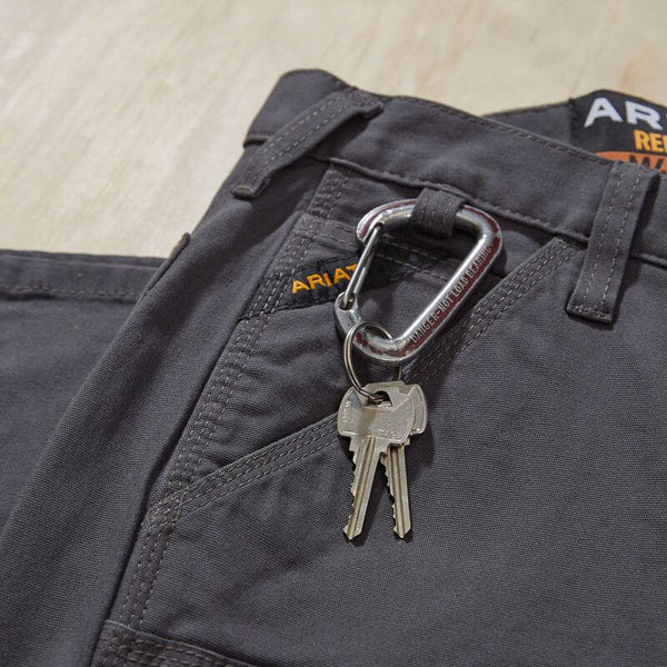 grey pants with a key ring attached to the belt loop