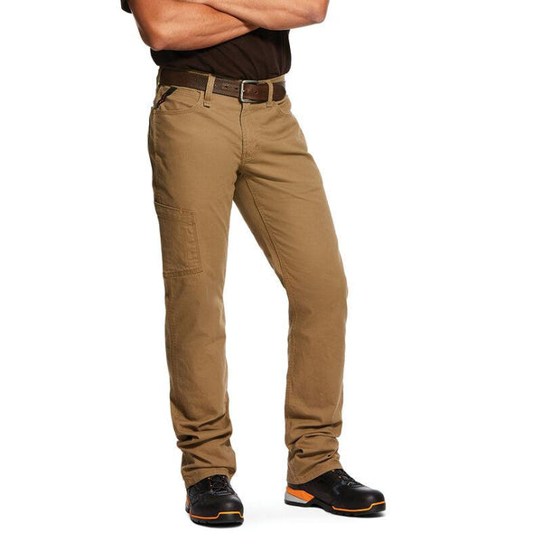 man wearing khaki pants and black and orange work shoes