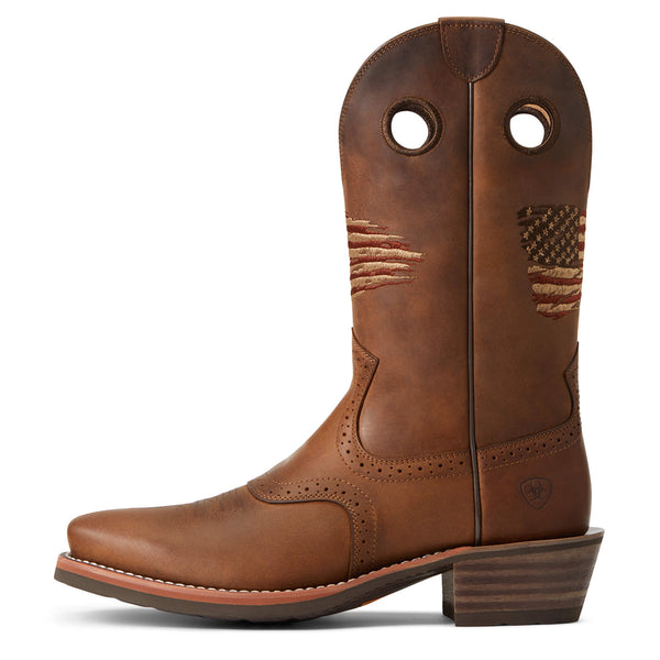 side view of distressed brown pull on western boot with embroidered rustic American flag on front and back of shaft