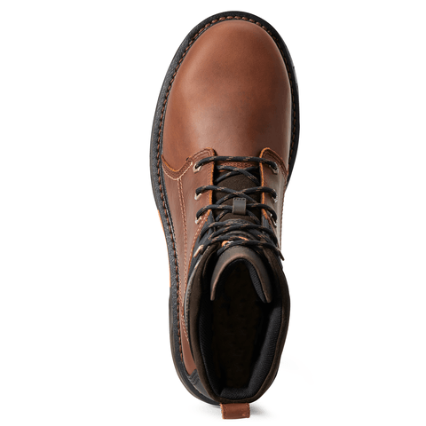 top view of mid rise tan work boot with black accent and dark brown sole