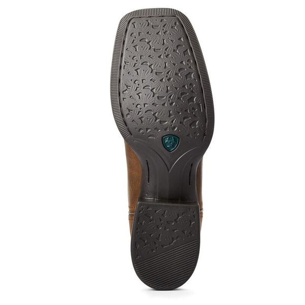 dark brown sole on cowgirl boot with embossed patern