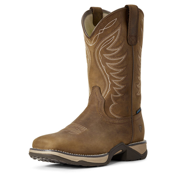 angled view of high top pull on light brown work boot with white embroidery