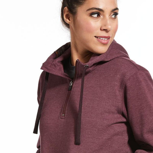 woman from chest up wearing a maroon hoodie