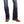 Load image into Gallery viewer, close up view of dark blue boot cut denim jeans with white stitching and medium brown square toe western boots