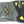 Load image into Gallery viewer, sole and tread of athletic work shoe in grey, black, and yellow with Carolina logo in arch