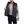 Load image into Gallery viewer, man holding one side of insulated black vest open over grey long sleeve shirt