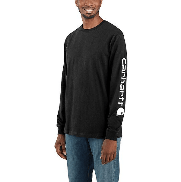 man wearing black long sleeve shirt with Carhartt logo down the sleeve