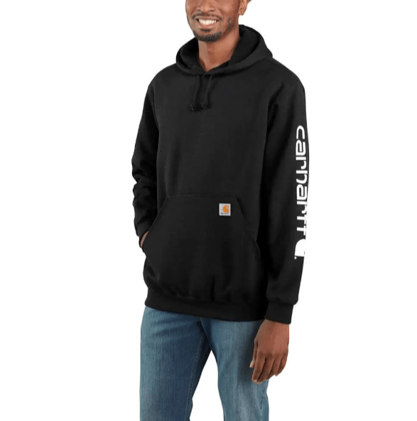 man wearing black hoodie with carhartt logo vertically on sleeve