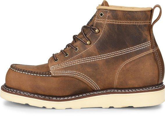 side view of mid-rise brown work boot with light brown sole