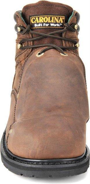 front of brown work boot with guard over laces and black sole