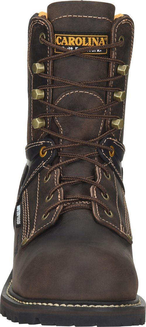 front of very dark brown hightop work boot with black accent at ankle