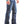 Load image into Gallery viewer, side view of man wearing blue jeans with large silver belt buckle and boots