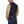 Load image into Gallery viewer, rear view of man smiling and wearing leather vest over brown long sleeve shirt
