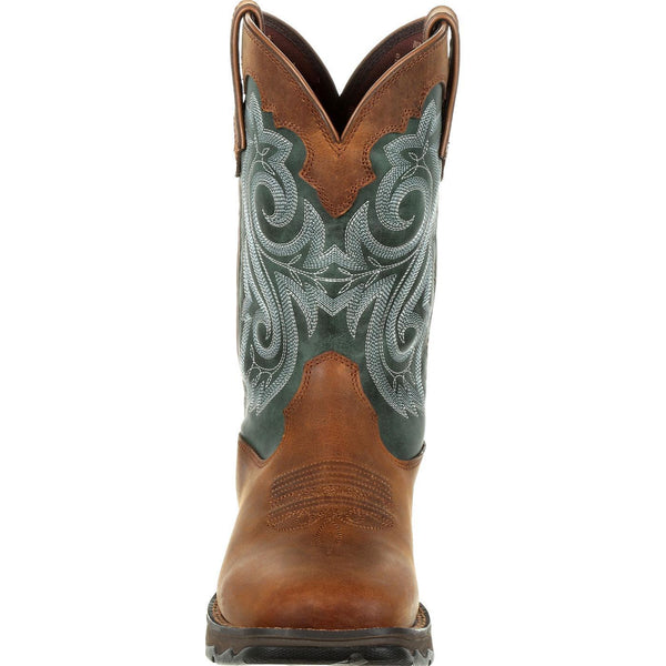 front of light brown cowgirl work boot with green shaft and white embroidery