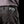 Load image into Gallery viewer, close rear view of black work pants with FXD logo tag on waistband and back pocket with grey stitching