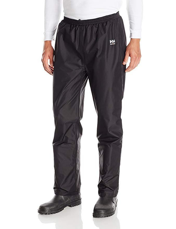 man wearing black waterproof pant and black boots