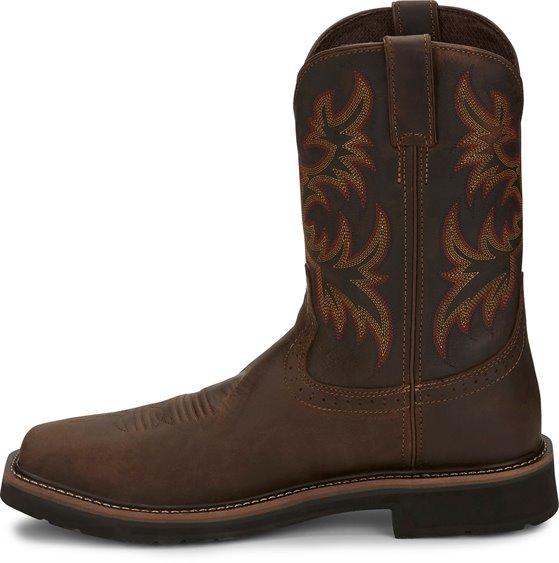 side of dark brown cowboy boot with orange and red embroidery