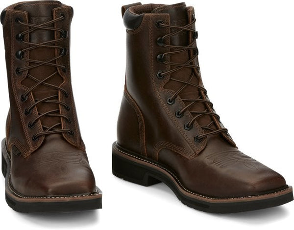 hightop brown boot with brown laces and black eyelets and embroidery on vamp