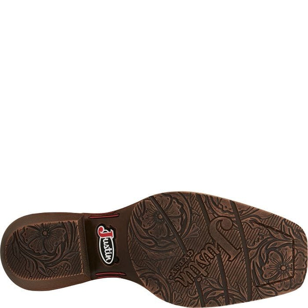 bottom view of women's square toe western boot, brown sole with floral design and Justin logo