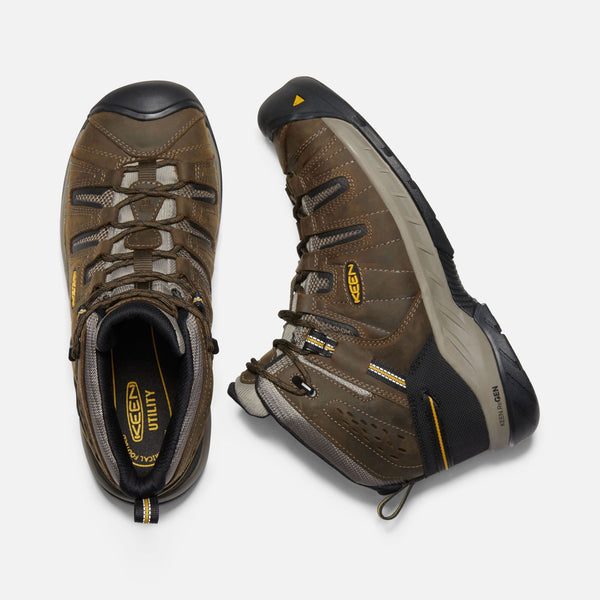 top view and side view of brown outdoor shoe with black toe guard and heel and brown laces