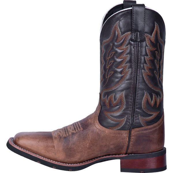 side of cowboy boot with black shaft and brown vamp. brown and white embroidery