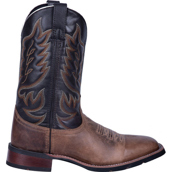 side of cowboy boot with black shaft and brown vamp. brown and white embroidery