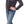 Load image into Gallery viewer, woman with hands on waist wearing black and white polka dot long sleeve shirt with leopard print collar and cuffs, light blue denim jeans and tan boots.