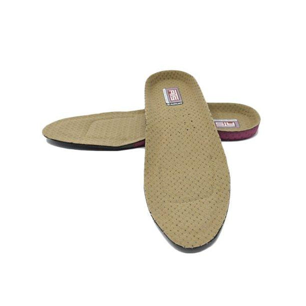 two brown shoe inserts laying on top of one another