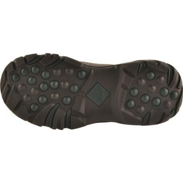 brown and green sole on boot