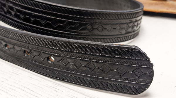black leather belt with stamped design 
