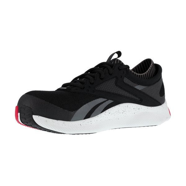 front angled view of black and grey tennis shoe style lace up work shoe with white and red sole
