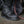 Load image into Gallery viewer, foot wearing black work boot with black string and black eyelets