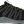 Load image into Gallery viewer, side of black tennis shoe style work shoe with black and green laces. green logo on heel