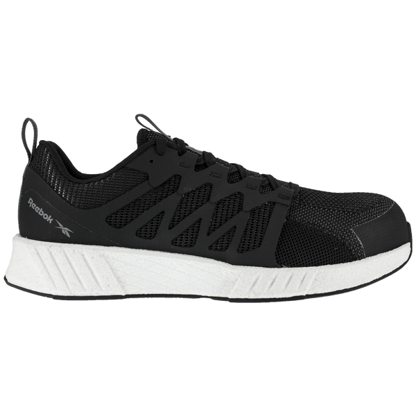 side of black tennis shoe style work shoe with white sole
