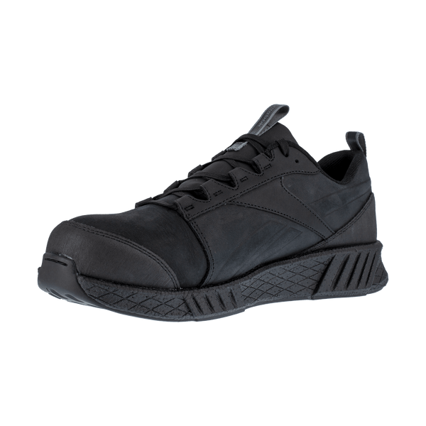 angled view of black shoe with black laces, black sole, and black toe guard