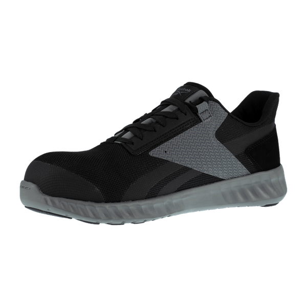 angled view of black shoe with grey accent, black laces, grey sole