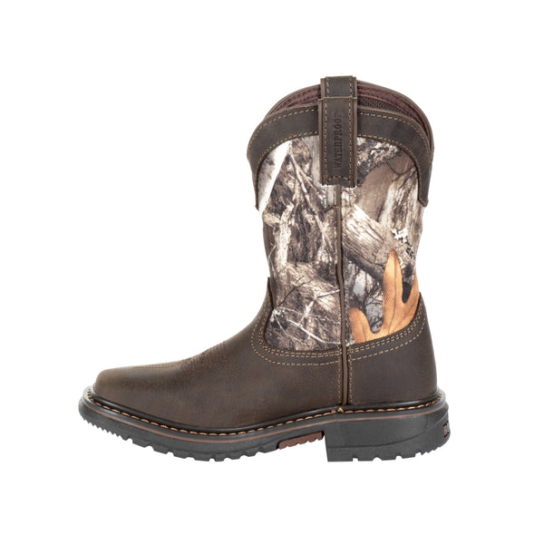 side of cowboy boot with camo shaft and brown vamp